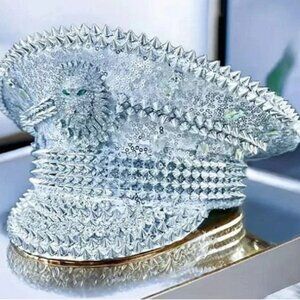 Silver Captain Hat Featuring a Rhinestone Lion with Emerald eyes